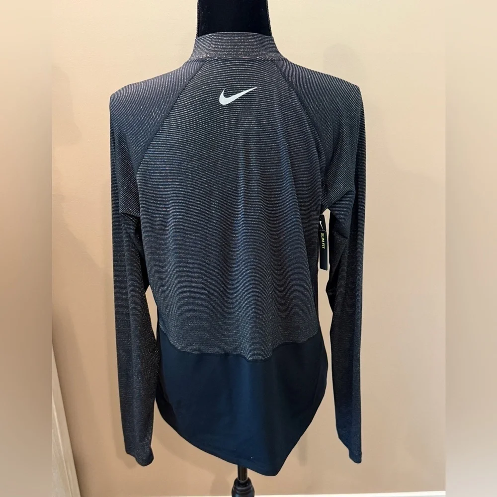 Women’s NWT NIKE Pro Dri-Fit Black/Gold metallic long sleeve top. Size XL